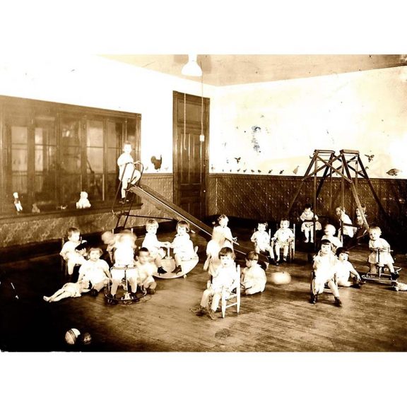 Vintage photo of playroom in new residence building